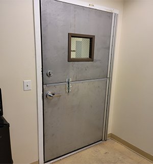 Metal Door Repair NYC | Hollow Metal & Steel Door Repair 1 Fire-rated door repair with exit device and push bar installation in NYC, metal door repair NYC