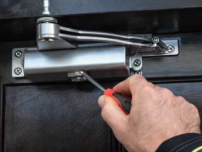 overhead concealed door closer repair NYC