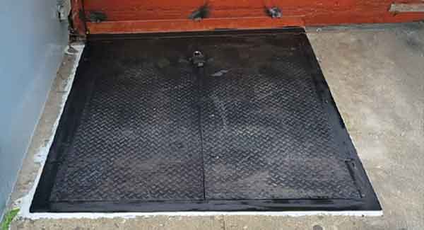 Sidewalk Cellar Door installation NYC