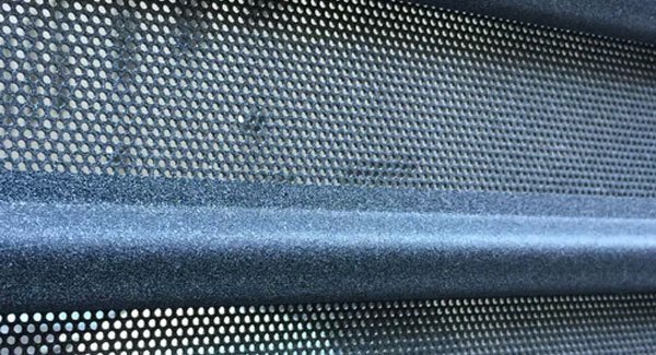 perforated roll-up door NYC commercial security gate with airflow