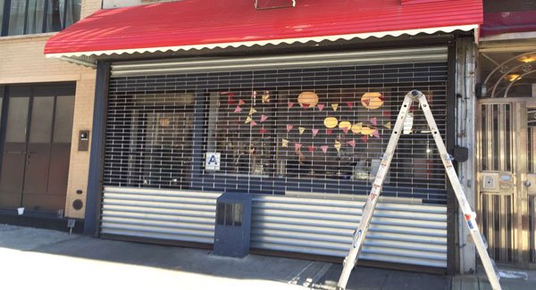 security grille door NYC storefront commercial rolling gate